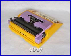 Retro chic! Olivetti Lettera 40 typewriter yellowithpurple 70s