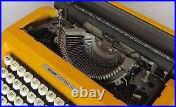 Retro chic! Olivetti Lettera 40 typewriter yellowithpurple 70s