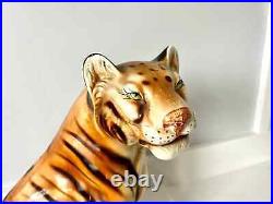 Vintage retro kitsch ceramic tiger figurine or ornament from the 1970s